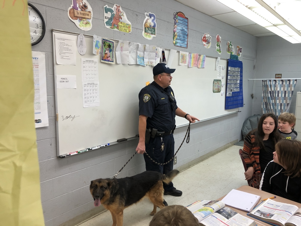 Officer Henson and rescue dog Layla